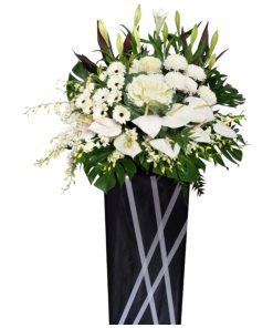 white funeral flower stand