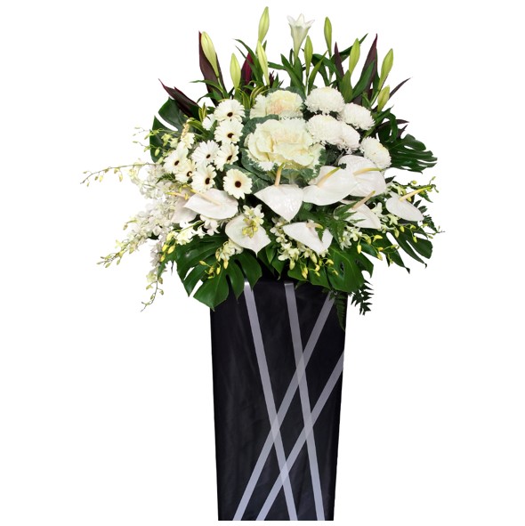 white funeral flower stand